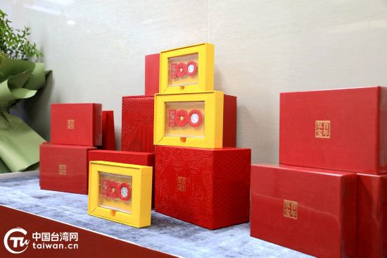 “团圆金”主题贵金属纪念币。(中国台湾网记者 尹赛楠 摄)
